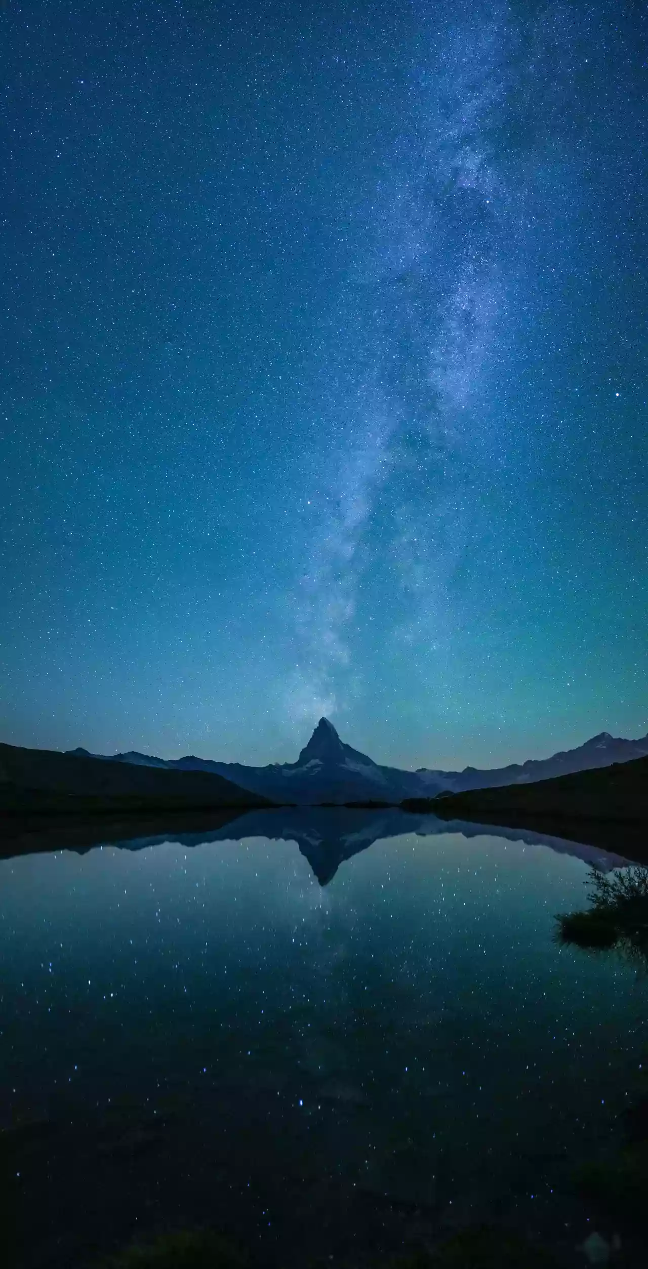 Milky way aligned with the Matterhorn reflecting in Stellisee Photo by Giles Laurent